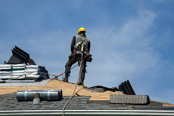 Professional Roof Replacement technician working in Merlin, OR